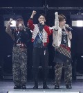 This undated photo provided by SM Entertainment on Oct. 2, 2023, shows K-pop boy group SHINee performing a concert at Saitama Super Arena in Japan. (PHOTO NOT FOR SALE) (Yonhap)