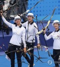 South Korean archers react after winning the final of the women's team recurve archery at Fuyang Yinhu Sports Center in Hangzhou, China, during the 19th Asian Games on Oct. 6, 2023. (Yonhap)