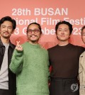 Actor John Cho, director Justin Chon, actor Steven Yeun and director Lee Isaac Chung (from L to R) pose for a photo after a press conference on a special program focusing on Korean diasporic cinema, a sideline event for the Busan International Film Festival, held on Oct. 6, 2023, in the southeastern port city of Busan. (Yonhap)