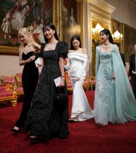 Members of South Korean girl band Blackpink attend the State Banquet during the South Korean President state visit, at Buckingham Palace in London, Britain November 21, 2023. Yui Mok/Pool via REUTERS