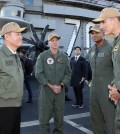 Defense Minister Shin Won-sik (L) meets Rear Adm. Carlos Sardiello, commander of carrier strike group one, (R) during his visit to the USS Carl Vinson, a nuclear-powered aircraft carrier docked in Busan, 320 kilometers southeast of Seoul, on Nov. 22, 2023, in this photo provided by the defense ministry. (PHOTO NOT FOR SALE) (Yonhap)