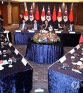 South Korean Deputy Foreign Minister Chung Byung-won (C, rear), Japanese Senior Deputy Foreign Minister Takehiro Funakoshi (3rd from L) and Chinese Assistant Foreign Minister Nong Rong (3rd from R) hold talks during a high-level meeting at a Seoul hotel on Sept. 26, 2023, to discuss three-way cooperation and explore the possibility of resuming the long-stalled summit of their leaders. (Yonhap)