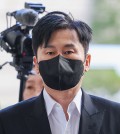 Yang Hyun-suk, founder and former head of YG Entertainment, appears at the Seoul High Court to attend a trial on Nov. 8, 2023. (Yonhap)SALE) (Yonhap)