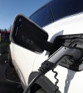 An Audi electric vehicle is being charged in a charging station in Drogenbos, Belgium November 25, 2023. REUTERS/Yves Herman