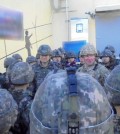 Joint Chiefs of Staff Chairman Adm. Kim Myung-soo (2nd from L) and Gen. Paul LaCamera (3rd from L), commander of the U.S.-led U.N. Command, meet South Korean troops stationed at a guard post in the central front line on Dec. 21, 2023, in this photo provided by Kim's office the next day. (PHOTO NOT FOR SALE) (Yonhap)