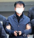 The assailant of opposition leader Lee Jae-myung leaves a police station in the southeastern city of Busan on Jan. 4, 2024, to attend a court hearing. (Yonhap)