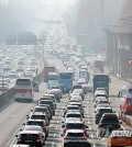 The southbound Gyeongbu Expressway is packed with cars leaving Seoul on the first day of the Lunar New Year holiday on Feb. 9, 2024. (Yonhap)