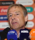 Jurgen Klinsmann, head coach of the South Korean men's national football team, speaks to reporters at Incheon International Airport, west of Seoul, in this file photo taken Feb. 8, 2024, after returning from the Asian Football Confederation Asian Cup in Qatar. (Yonhap)