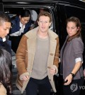 Meta Platforms Inc. CEO Mark Zuckerberg (C) arrives at LG Electronics Co.'s headquarters in Seoul on Feb. 28, 2024. (Yonhap)