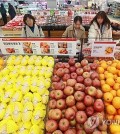 Customers shop at a major discount chain store in Seoul on Feb. 28, 2024. (Yonhap)