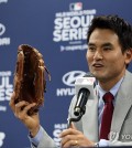 Former South Korean major league pitcher Park Chan-ho speaks at a press conference at Gocheok Sky Dome in Seoul on March 20, 2024, before throwing out the ceremonial first pitch ahead of the opening game of Major League Baseball's Seoul Series between the Los Angeles Dodgers and the San Diego Padres. (Yonhap)