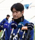 South Korean football player Lee Kang-in apologized for his role in a locker room row during a recent tournament Wednesday, saying he had let so many fans down with his action and he will try to grow from the experience. Lee, midfielder for Paris Saint-Germain, addressed the South Korean media for the first time Wednesday since getting into a scuffle with national team captain Son Heung-min during the Asian Football Confederation Asian Cup in Qatar. Lee and some younger members of the team left team dinner early to play table tennis, but Son wanted the occasion to be an opportunity for team bonding before playing Jordan in the semifinals. South Korean football player Lee Kang-in stands behind mics at Seoul World Cup Stadium in Seoul on March 20, 2024, to offer an apology for his role in a row during the Asian Football Confederation Asian Cup. (Yonhap) South Korean football player Lee Kang-in stands behind mics at Seoul World Cup Stadium in Seoul on March 20, 2024, to offer an apology for his role in a row during the Asian Football Confederation Asian Cup. (Yonhap) When Lee refused Son's order to rejoin the team, the two got into a shoving match, leading to a dislocated finger for Son. When the incident was revealed after South Korea's loss to Jordan, Lee took a beating in public for defying Son, a beloved captain and one of South Korea's most popular athletes. Lee later visited Son in London to apologize to him in person. Then he stood in front of cameras Wednesday at Seoul World Cup Stadium, after being named to the national team for home-and-away World Cup qualifying matches against Thailand. The first match is 8 p.m. Thursday in Seoul. "I received so much love and support from fans during the Asian Cup, but I did not reward my fans and I disappointed them," Lee said. "I wanted to come here to apologize to them from the bottom of my heart." Lee thanked Hwang Sun-hong, caretaker boss for the national team, for selecting him for the World Cup qualifiers, and said he will try to learn from his mistakes. "Criticism from everyone will help me down the road," Lee said. "I will try hard to become a better person and a better football player, someone who can help the team and set good examples." Lee did not take questions from media. South Korean football player Lee Kang-in bows behind mics at Seoul World Cup Stadium in Seoul on March 20, 2024, to offer an apology for his role in a row during the Asian Football Confederation Asian Cup. (Yonhap) South Korean football player Lee Kang-in bows behind mics at Seoul World Cup Stadium in Seoul on March 20, 2024, to offer an apology for his role in a row during the Asian Football Confederation Asian Cup. (Yonhap) The Korea Football Association said Lee had prepared his own words for the occasion. Earlier in the day, Son said at the prematch press conference that Lee had offered "a heartfelt apology" to his teammates during Tuesday's dinner and that they had fully accepted it. "It takes courage to apologize, and Kang-in stood in front of everyone to do it sincerely," Son said. "I think it allowed everyone to really come close. The vibe in the room is not too bad." Son said he was ready to move on. "I think you won't have to write about my finger anymore," Son said. He then deadpanned, "My coach at Tottenham (Ange Postecoglou) said since I am a football player, I'd be okay without a finger." Son Heung-min, captain of the South Korean men's national football team, speaks at a press conference at Seoul World Cup Stadium in Seoul on March 20, 2024. (Yonhap) Son Heung-min, captain of the South Korean men's national football team, speaks at a press conference at Seoul World Cup Stadium in Seoul on March 20, 2024. (Yonhap)