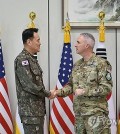 Joint Chiefs of Staff (JCS) Chairman Adm. Kim Myung-soo (L) meets Gen. Stephen Whiting, head of the U.S. Space Command, at his office in Seoul on April 22, 2024, in this photo provided by the JCS. (PHOTO NOT FOR SALE) (Yonhap)