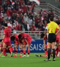 South Korean players react to their 11-10 penalty shootout loss to Indonesia in the quarterfinals at the Asian Football Confederation U-23 Asian Cup at Abdullah bin Khalifa Stadium in Doha on April 25, 2024, in this photo provided by the Korea Football Association. (PHOTO NOT FOR SALE) (Yonhap)