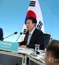 President Yoon Suk Yeol (C) speaks during a national financial strategy meeting at the government complex in Sejong, 113 kilometers south of Seoul, on May 17, 2024. (Yonhap)