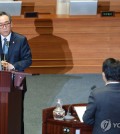 Foreign Minister Cho Tae-yul (L) answers a lawmaker's questions during an interpellation at the National Assembly in Seoul on Feb. 12, 2025. (Yonhap)