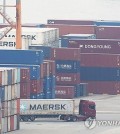 Containers are stacked at a port in the city of Pyeongtaek, Gyeonggi Province, on April 9, 2025. (Yonhap)