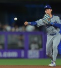 May 5, 2025; Miami, Florida, USA; Los Angeles Dodgers second baseman Hyeseong Kim (6) throws to first base to retire Miami Marlins left fielder Kyle Stowers (28) during the first inning at loanDepot Park. Mandatory Credit: Sam Navarro-Imagn Images