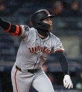 Apr 11, 2025; Bronx, New York, USA; San Francisco Giants center fielder Jung Hoo Lee (51) hits a three run home run during the first inning against the New York Yankees at Yankee Stadium. Mandatory Credit: Vincent Carchietta-Imagn Images